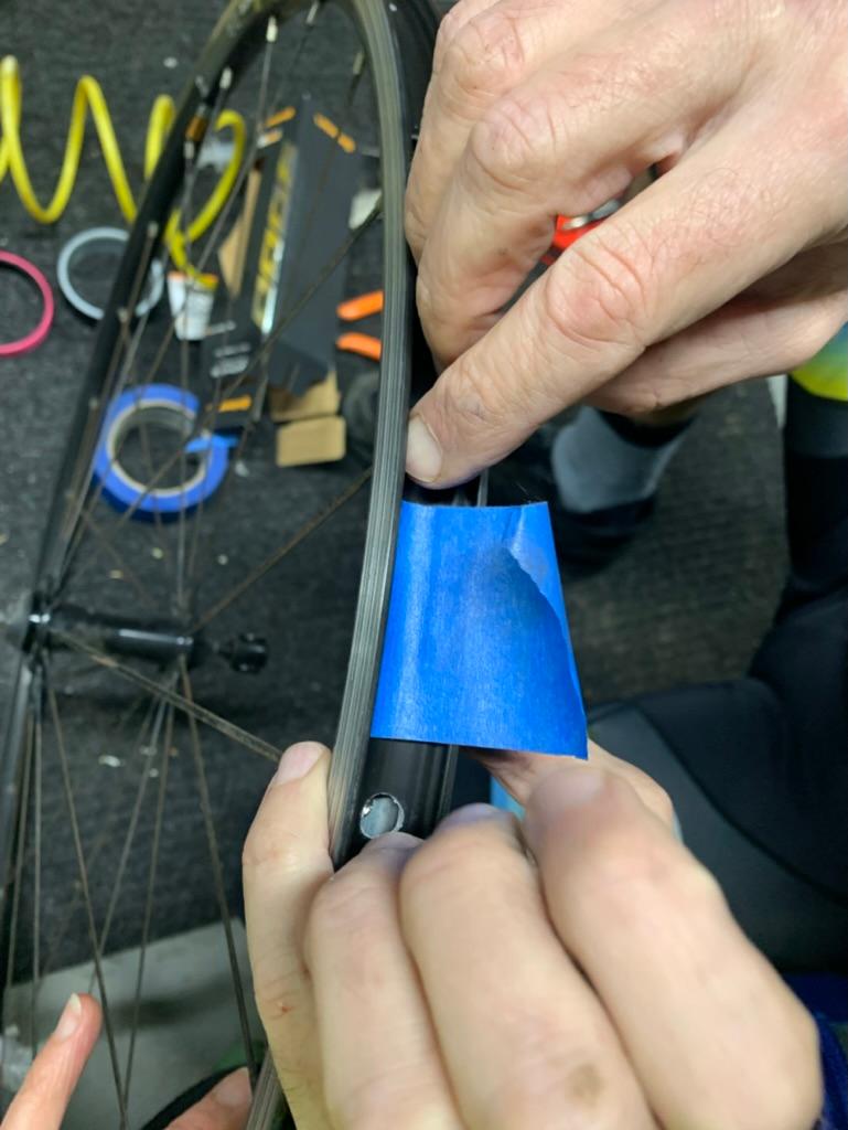 Applying tape for rim measurement